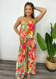DEVICA ONE SHOULDER PLEATED FLORAL JUMPER