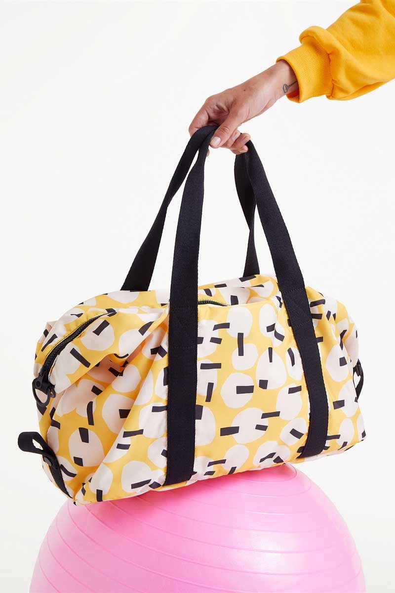 YELLOW PRINTED DUFFLE BAG