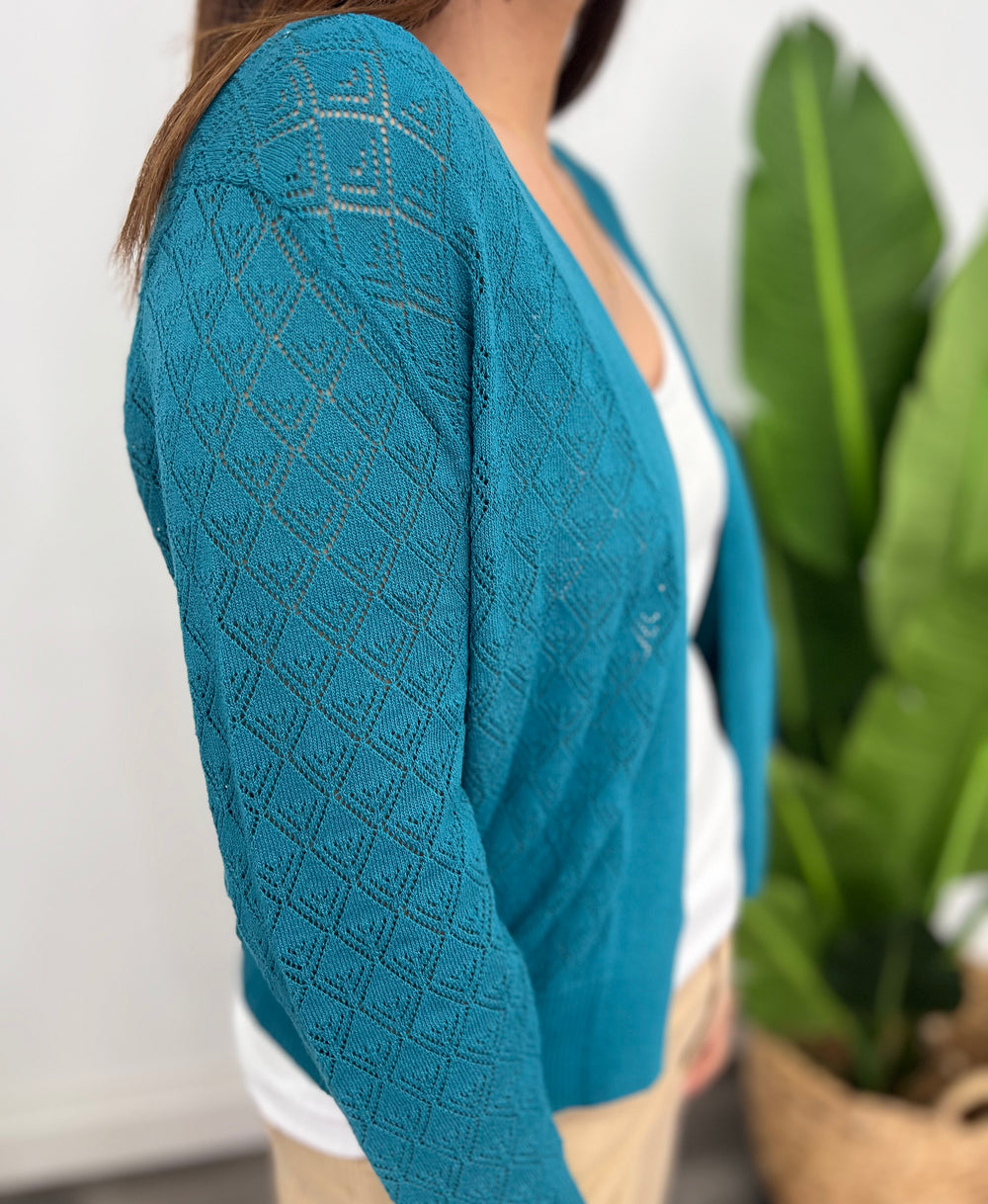 LIDIA OPEN CARDI TEAL W/PERF PRINT