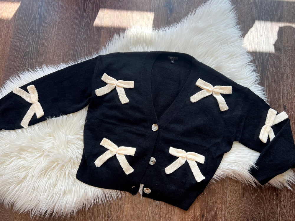 BOW UP BLK CARDI W/IVORY BOWS