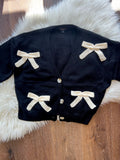 BOW UP BLK CARDI W/IVORY BOWS