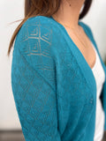 LIDIA OPEN CARDI TEAL W/PERF PRINT